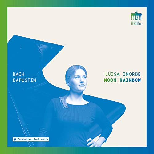 CD cover with a woman standing by a grand piano, blue and green gradient border.