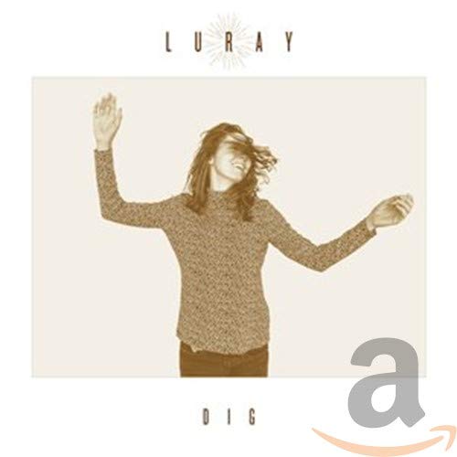 Album cover with a woman in a sweater, arms raised, sepia-toned image.