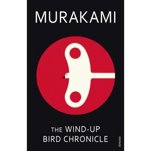 The image is a book cover. Alt text: Black book cover with red circle and white bird graphic.