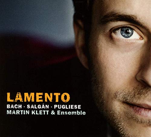 A close-up of a man's face with the title "Lamento" and artist names.