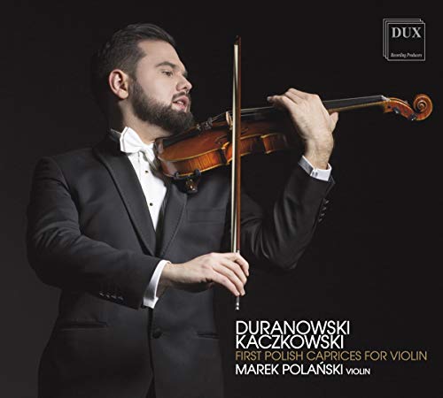 Man in a tuxedo plays a violin, against a black background with text.