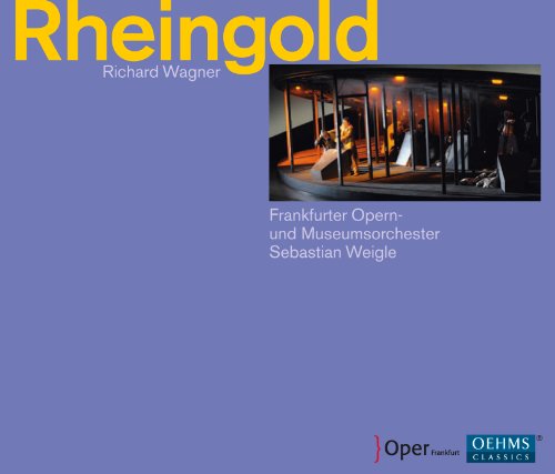 "CD cover with purple background, yellow title 'Rheingold', and opera scene image."