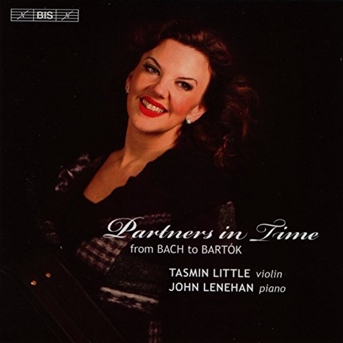 CD cover featuring a smiling woman holding a violin against a black background.