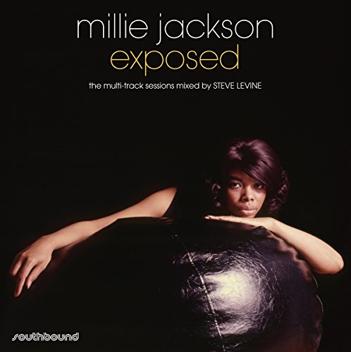 Vinyl album cover featuring Millie Jackson posing with a vinyl record on a black background.