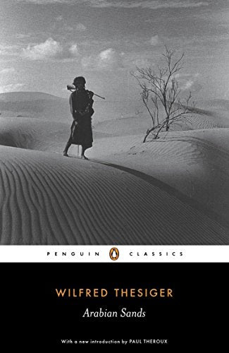 "Black and white book cover with desert landscape and man walking, Penguin Classics logo."