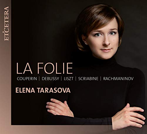 "Elena Tarasova's album cover featuring a woman in a black turtleneck against a dark background."