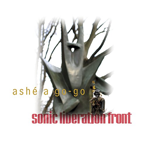 Album cover with a person standing beside a large, abstract tree-like structure.