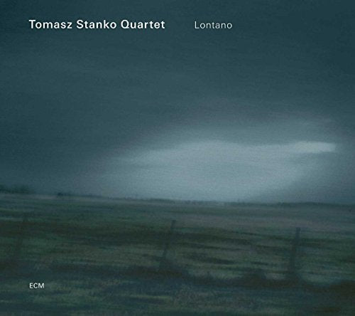 "Album cover with dark landscape, cloudy sky, and 'Tomasz Stanko Quartet - Lontano' text."