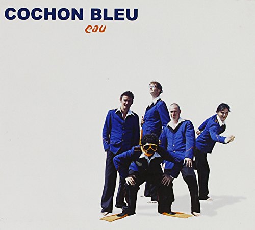 Album cover featuring four men in blue suits posing against a plain white background.