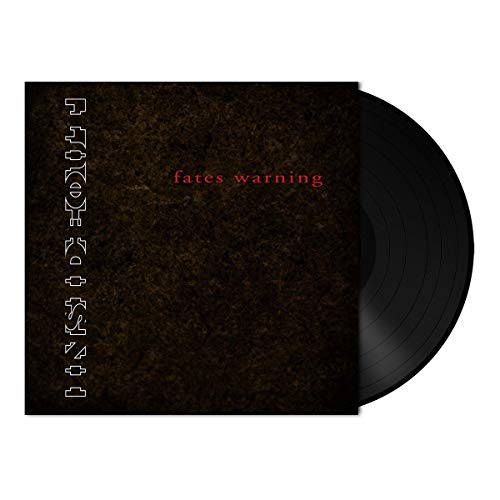 Vinyl record with dark brown cover, partially visible, and red and white text.