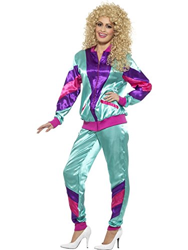 Woman wearing shiny green, purple, and pink 80s shell suit costume and curly blonde wig.