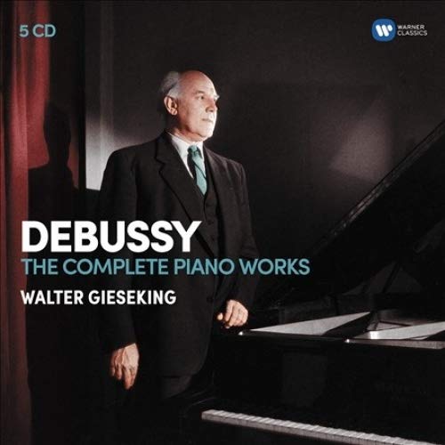 CD cover featuring Walter Gieseking standing beside a piano, wearing a suit and green tie.