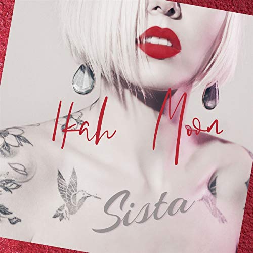 Vinyl record cover featuring a woman with blonde hair and tattoos, titled "Sista".