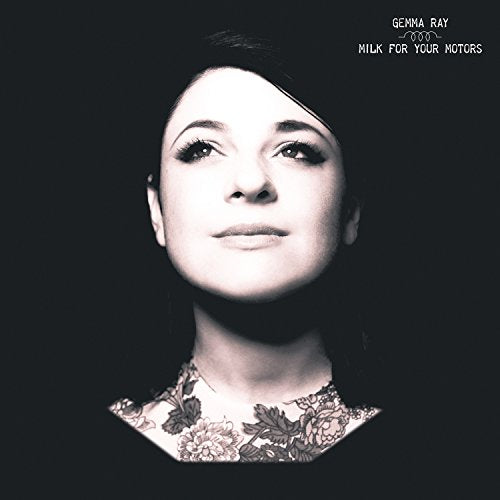 Album cover with a black-and-white portrait of a woman against a dark background.