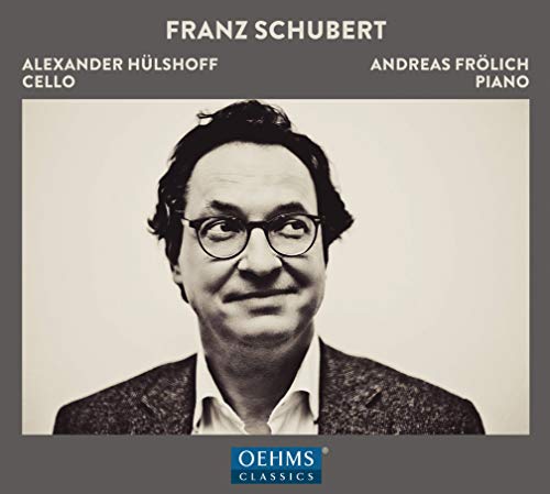 CD cover featuring a black-and-white portrait of a man with glasses and a jacket.