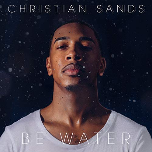 Album cover with a man in a white t-shirt, surrounded by water droplets.