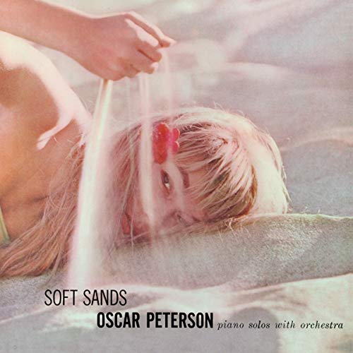 A CD cover featuring a reclining blonde woman with water poured on her head.
