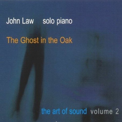 "CD cover with dark blue background, shadowy figure, and text: John Law solo piano album."