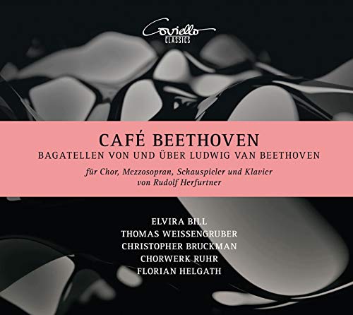 "CD cover with pink banner, black and white piano keys background, and white text."