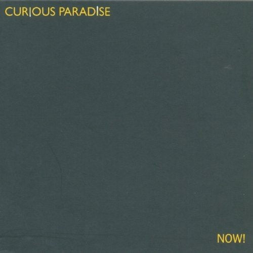 Dark green album cover with "Curious Paradise" and "Now!" text in yellow font corners.