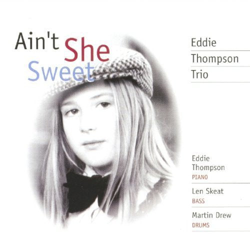 "Album cover with a black and white girl's portrait and multicolored title text."