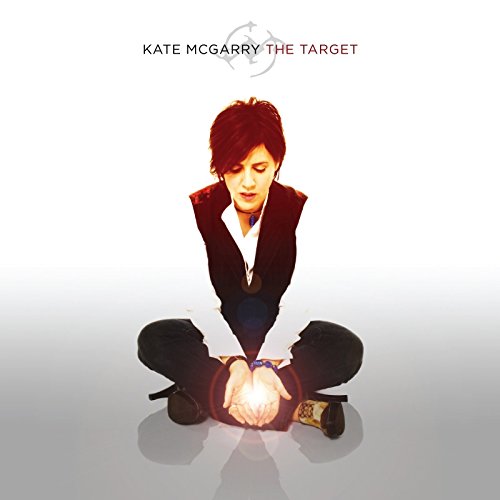 "Kate McGarry album cover with a woman sitting, holding a glowing target."