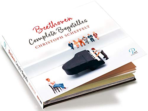 "CD booklet with white cover, piano image, and miniature people around it."