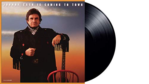 Vinyl record with cover featuring Johnny Cash standing by a chair at sunset.