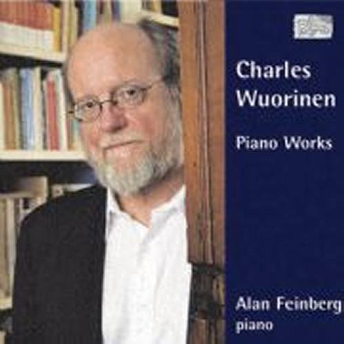 CD cover with a man standing by a bookshelf, text on a blue background.