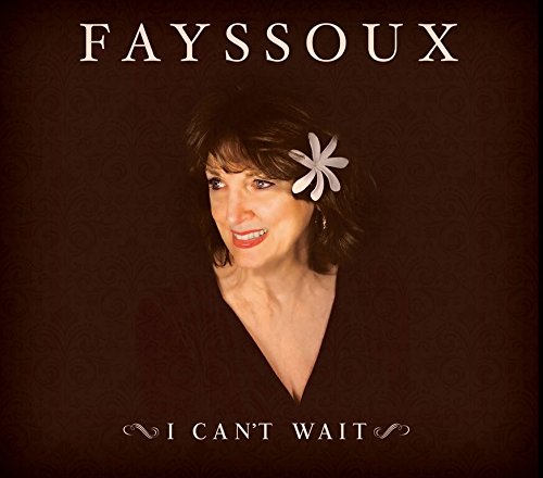 Album cover featuring a smiling woman with a flower in her hair.