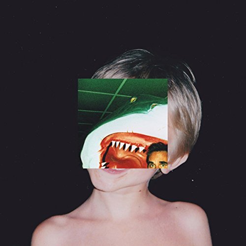 "Album cover with a child and a distorted, surreal image over their face."