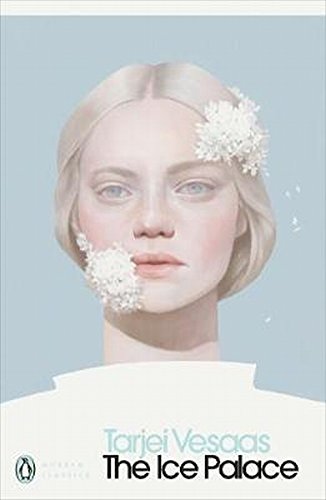 Book cover with a woman's face, snowflakes on her chin and forehead, pale blue background.