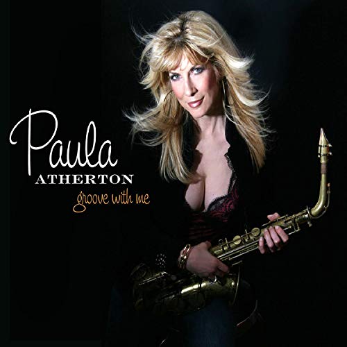 "Album cover featuring Paula Atherton holding a saxophone, with her name and album title."