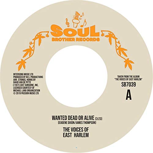A beige vinyl record label with orange and black text and illustrations.