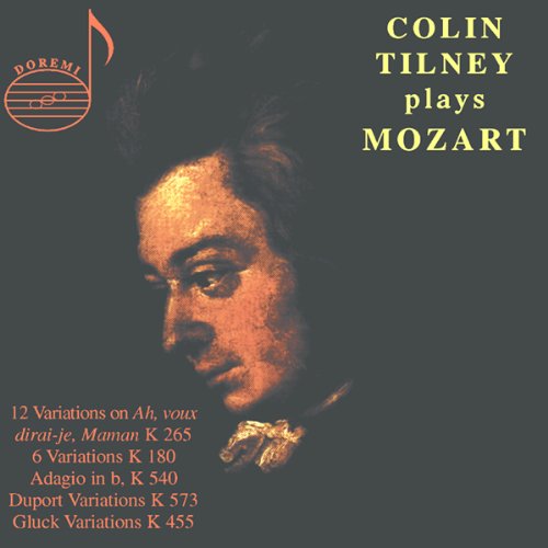 "CD cover featuring a portrait of Mozart with yellow and red text on a black background."