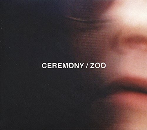 "CD cover art: close-up of a person's face with 'CEREMONY / ZOO' text."