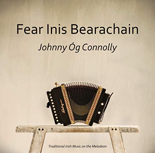 "Album cover featuring a black melodeon on a wooden stool, beige background."