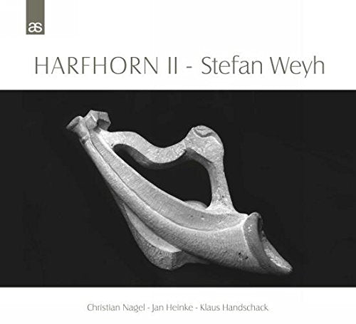 A monochrome image of a CD cover featuring a stone harp against a black background.