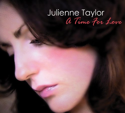 Julienne Taylor's album cover: close-up of a woman's face with dark hair and bangs.
