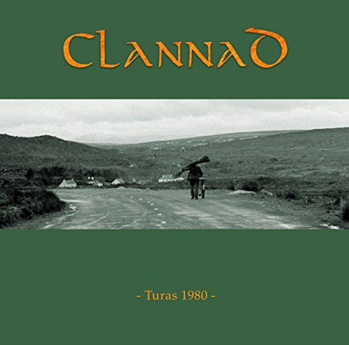 "Green vinyl album cover with a black-and-white photo of a man walking down a road."