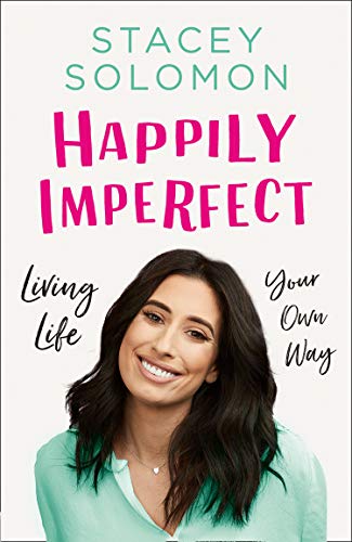 Book cover with a smiling woman and title "Happily Imperfect" in pink text on white background.