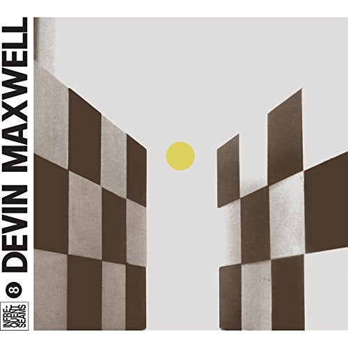 "Album cover with geometric shapes and yellow circle, artist's name on the left."