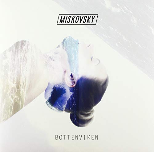A vinyl record cover with a woman's face, distorted and blue-toned, on a white background.