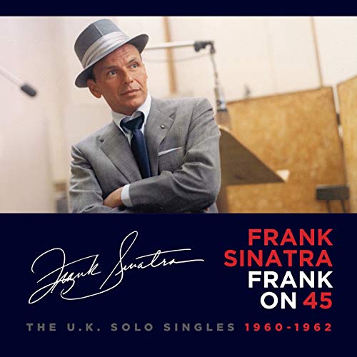 "Frank Sinatra in a grey suit and hat on a CD cover."