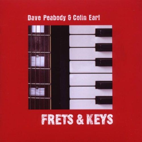 "Red album cover with guitar fretboard and piano keys, titled 'Frets & Keys'."