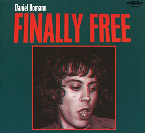 Album cover with a man's portrait and bold red title "FINALLY FREE" on dark green.