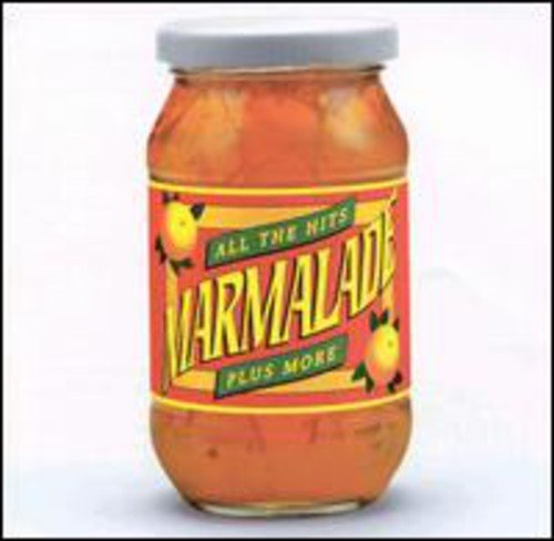 A jar of orange marmalade with a red, yellow, and green label.