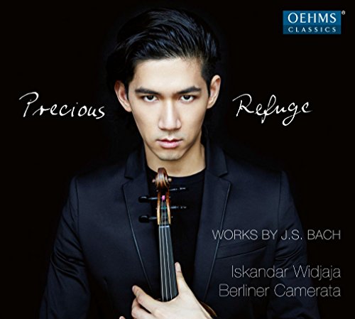 CD cover featuring a man holding a violin against a black background.