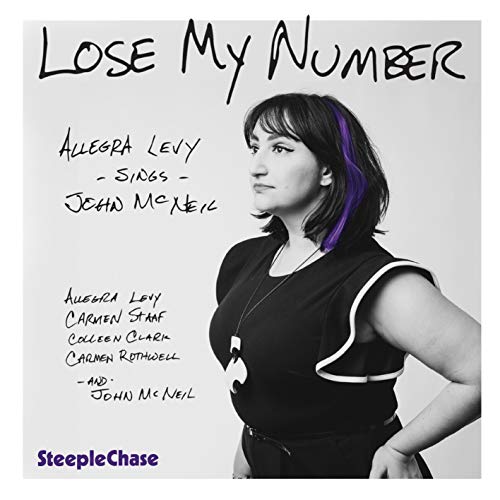 "Album cover with a black and white photo of a woman and purple hair streak."