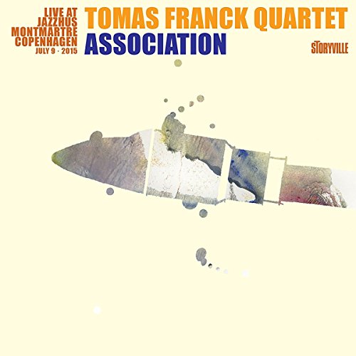 A pale yellow album cover with abstract design and orange and blue text.